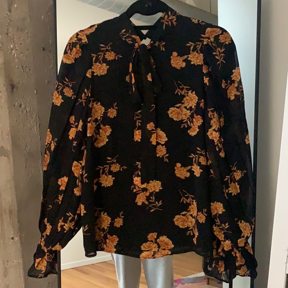 Floral printed pussy bow blouse with trumpet tied sleeves